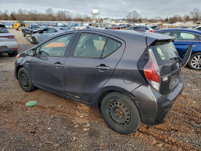 Photo 2 from auction – 2015 TOYOTA PRIUS C with VIN JTDKDTB34F1106556