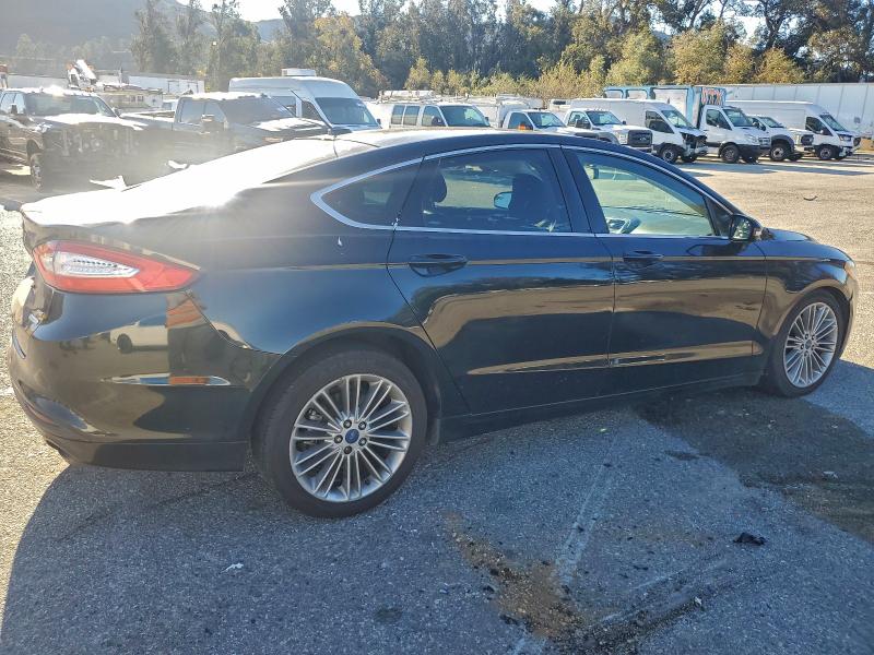 Photo 3 from auction – 2014 FORD FUSION SE with VIN 3FA6P0HD5ER283876