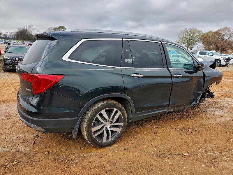 Photo 3 from auction – 2016 HONDA PILOT TOUR with VIN 5FNYF5H95GB009788