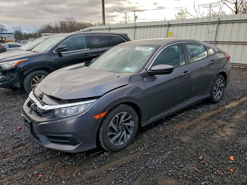 HONDA CIVIC EX 2017 with VIN 2HGFC2F77HH518164 - Photo from auction