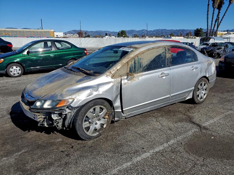 HONDA CIVIC LX 2011 with VIN 19XFA1F50BE049841 - Photo from auction