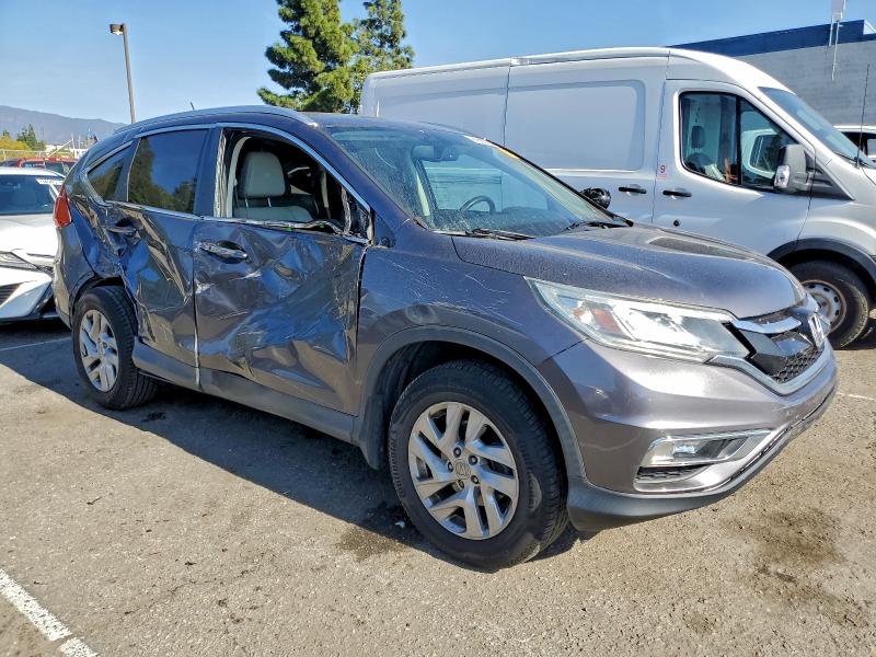 Photo 4 from auction – 2015 HONDA CR-V EXL with VIN 2HKRM3H77FH536941