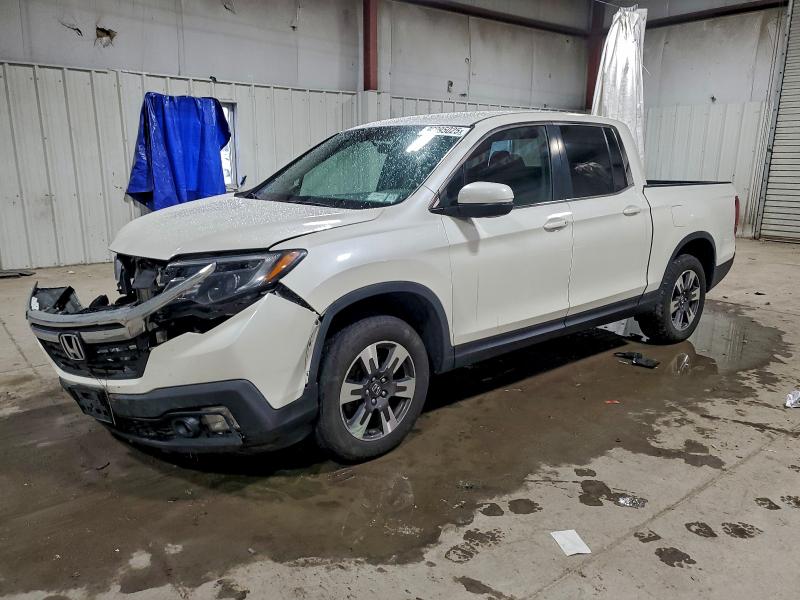 HONDA RIDGELINE 2017 with VIN 5FPYK3F58HB027906 - Photo from auction