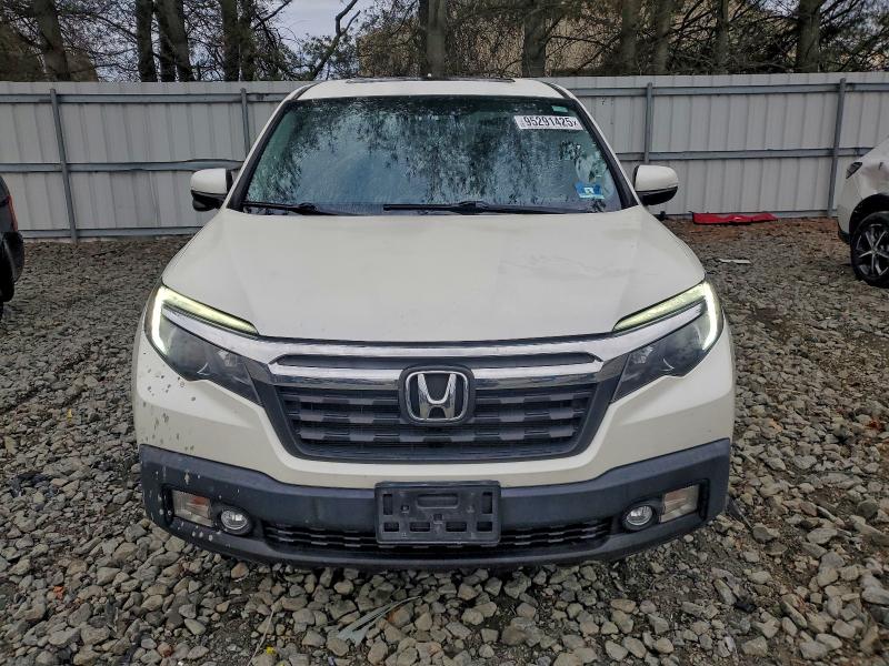 Photo 5 from auction – 2019 HONDA RIDGELINE with VIN 5FPYK3F67KB002317