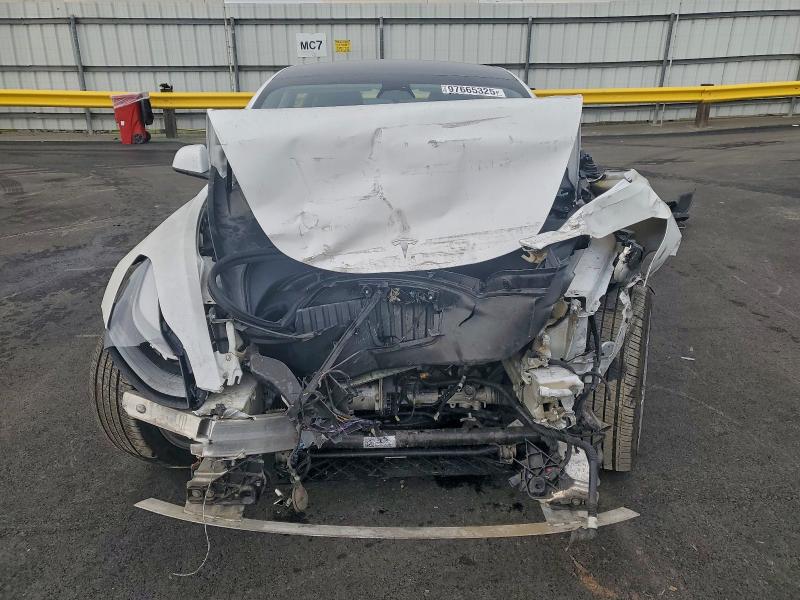 Photo 5 from auction – 2021 TESLA MODEL 3 with VIN 5YJ3E1EBXMF936908