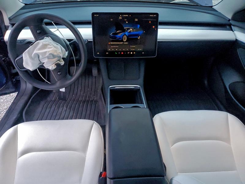 Photo 8 from auction – 2023 TESLA MODEL 3 with VIN 5YJ3E1EAXPF704109