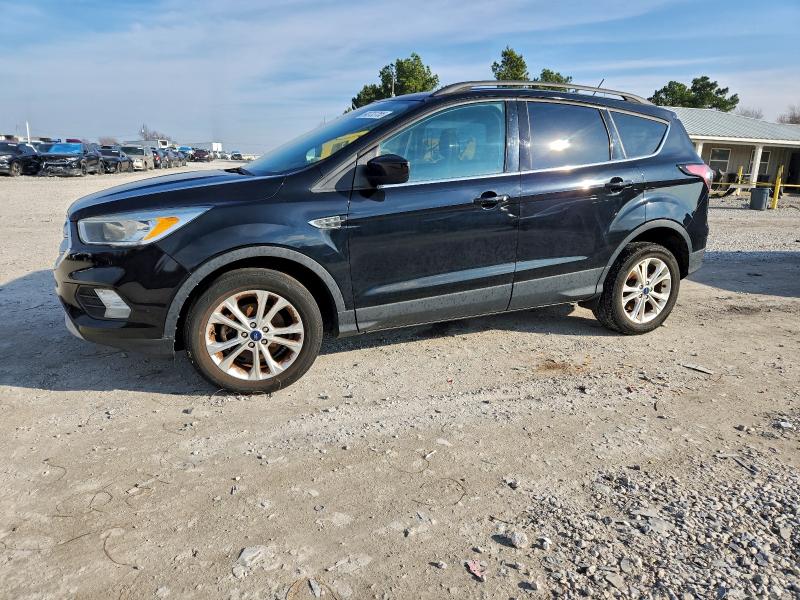 FORD ESCAPE SE 2018 with VIN 1FMCU0GD8JUA97285 - Photo from auction