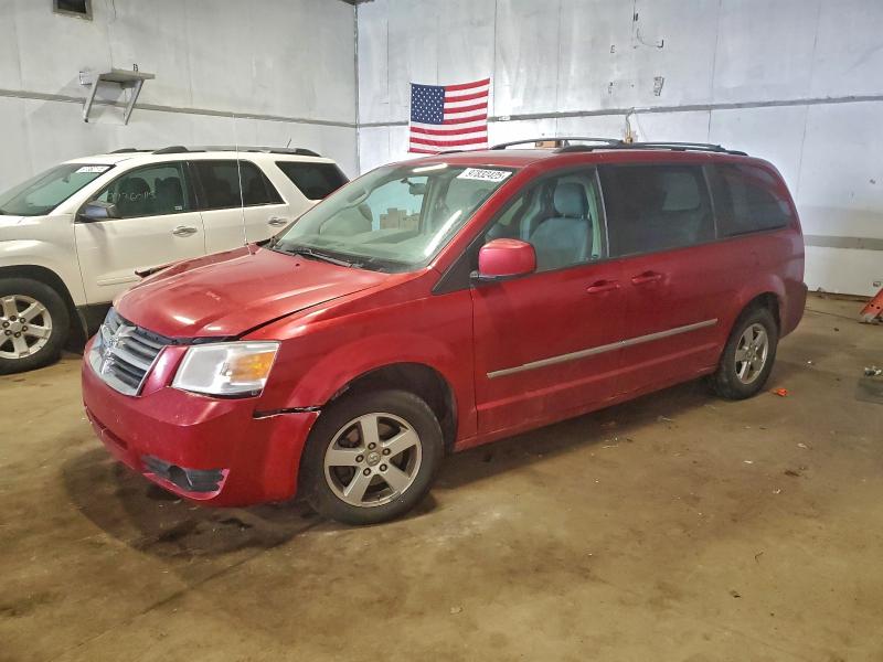 DODGE GRAND CARA 2010 with VIN 2D4RN5D17AR107890 - Photo from auction