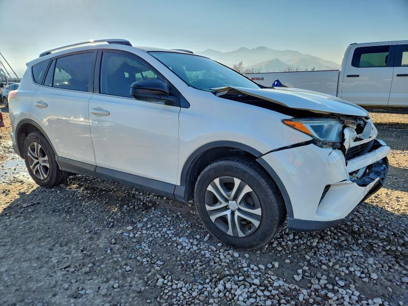 Photo 4 from auction – 2016 TOYOTA RAV4 LE with VIN JTMBFREV7GJ065268