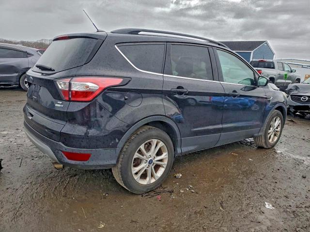 Photo 3 from auction – 2017 FORD ESCAPE SE with VIN 1FMCU9GD6HUD14105