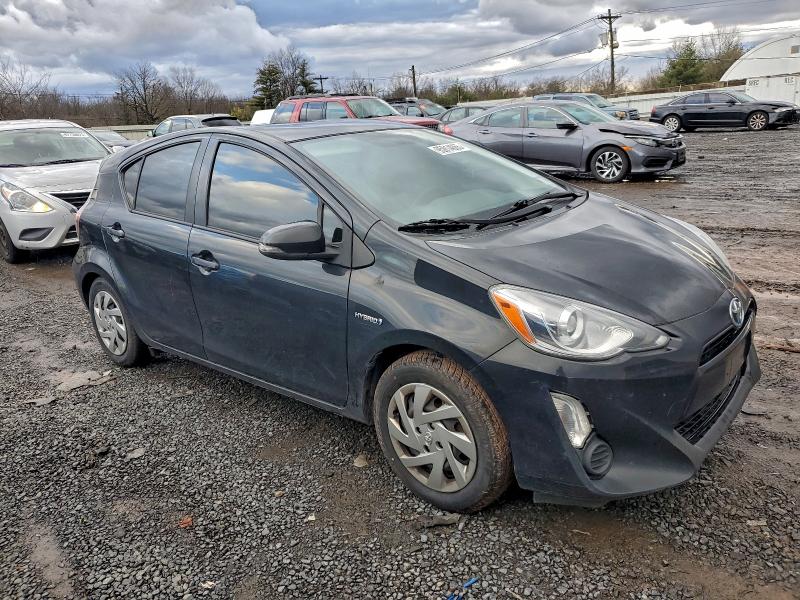 Photo 4 from auction – 2015 TOYOTA PRIUS C with VIN JTDKDTB34F1582919