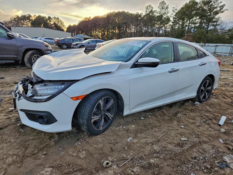 HONDA CIVIC TOUR 2018 with VIN JHMFC1F90JX023007 - Photo from auction