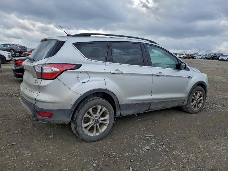Photo 3 from auction – 2018 FORD ESCAPE SE with VIN 1FMCU0GD5JUB00126