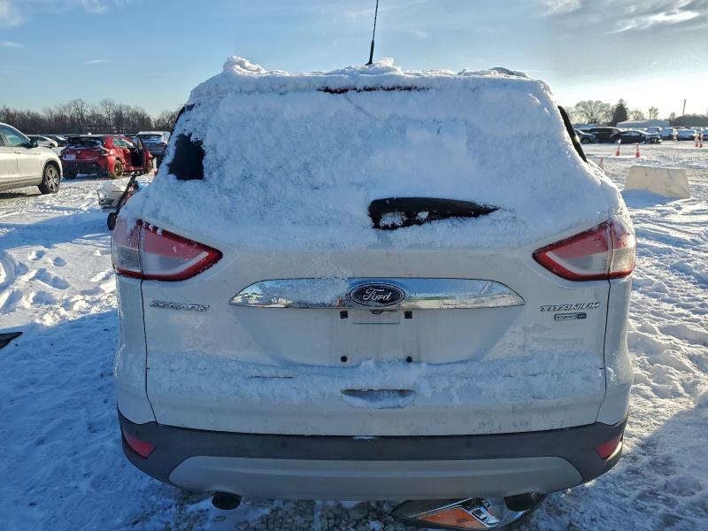 Photo 6 from auction – 2015 FORD ESCAPE TIT with VIN 1FMCU9J96FUB89642