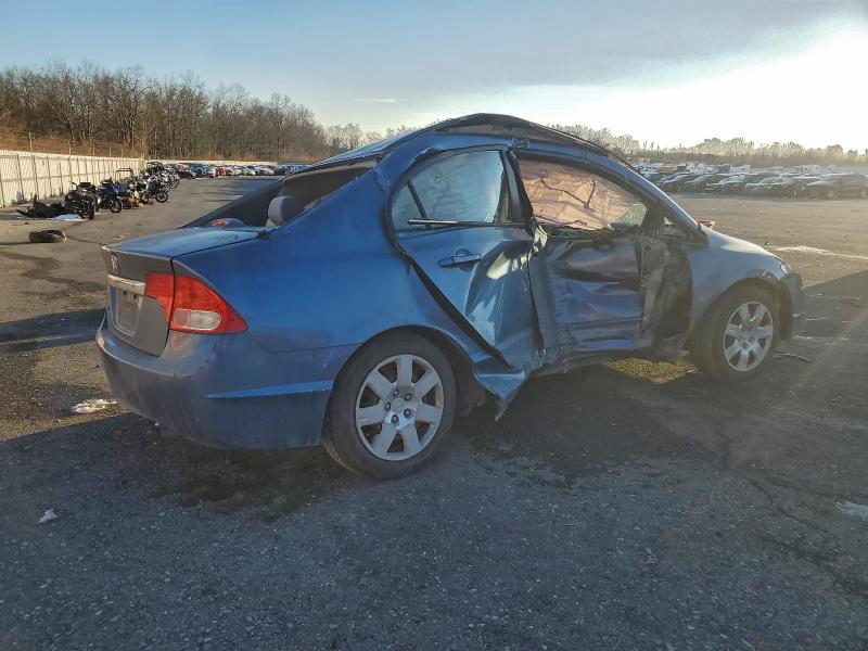 Photo 3 from auction – 2011 HONDA CIVIC LX with VIN 2HGFA1F56BH547094