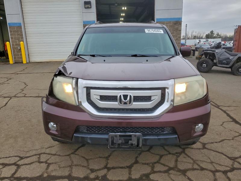 Photo 5 from auction – 2011 HONDA PILOT EXL with VIN 5FNYF4H62BB044894