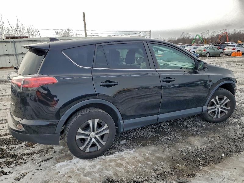 Photo 3 from auction – 2018 TOYOTA RAV4 LE with VIN 2T3BFREV2JW727492