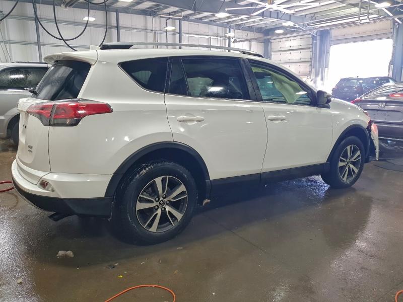 Photo 3 from auction – 2017 TOYOTA RAV4 XLE with VIN JTMRFREV5HD211407