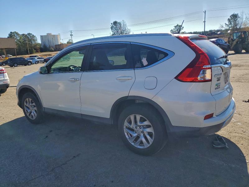 Photo 2 from auction – 2015 HONDA CR-V EXL with VIN 5J6RM4H73FL091223