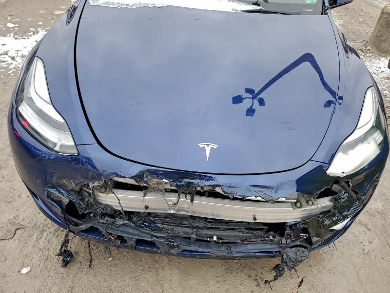 Photo 11 from auction – 2022 TESLA MODEL Y with VIN 7SAYGDEE2NF437584