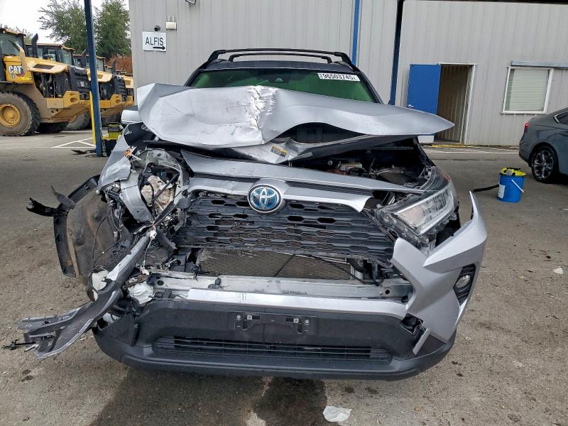 Photo 5 from auction – 2021 TOYOTA RAV4 XLE with VIN JTMR6RFVXMD508634