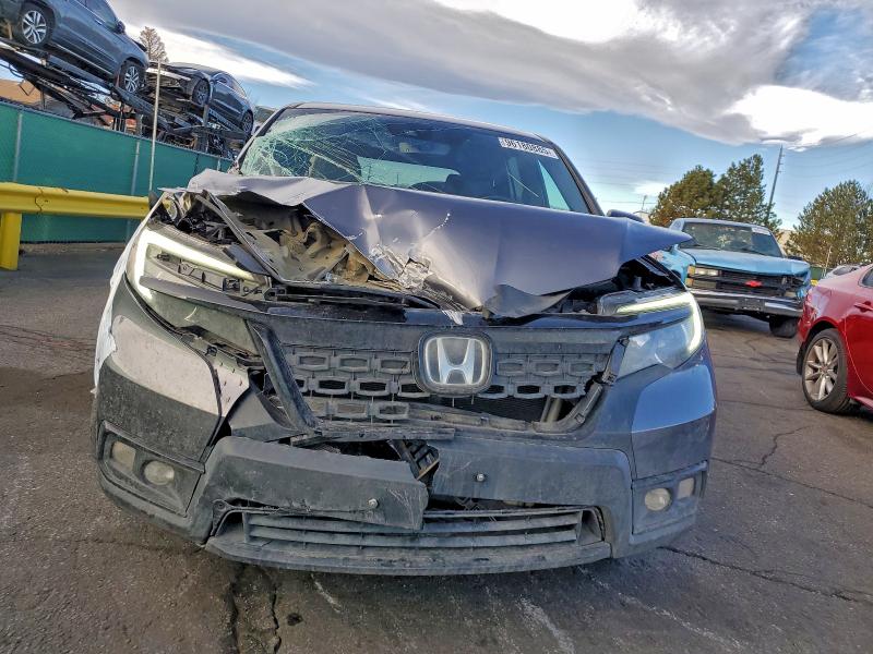 Photo 5 from auction – 2020 HONDA PASSPORT E with VIN 5FNYF8H52LB005769