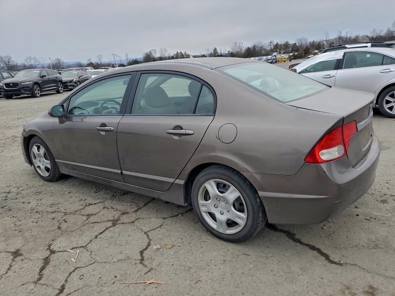 Photo 2 from auction – 2010 HONDA CIVIC with VIN 2HGFA1F53AH559475