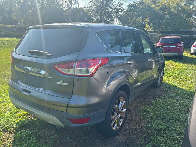 Photo 4 from auction – 2013 FORD ESCAPE SEL with VIN 1FMCU0HX8DUD49128