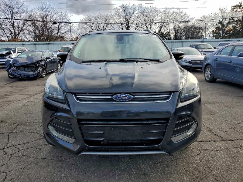 Photo 5 from auction – 2015 FORD ESCAPE TIT with VIN 1FMCU9J98FUB59266