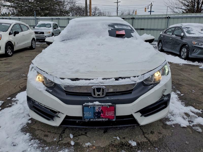 Photo 5 from auction – 2018 HONDA CIVIC LX with VIN 19XFC2F52JE024809