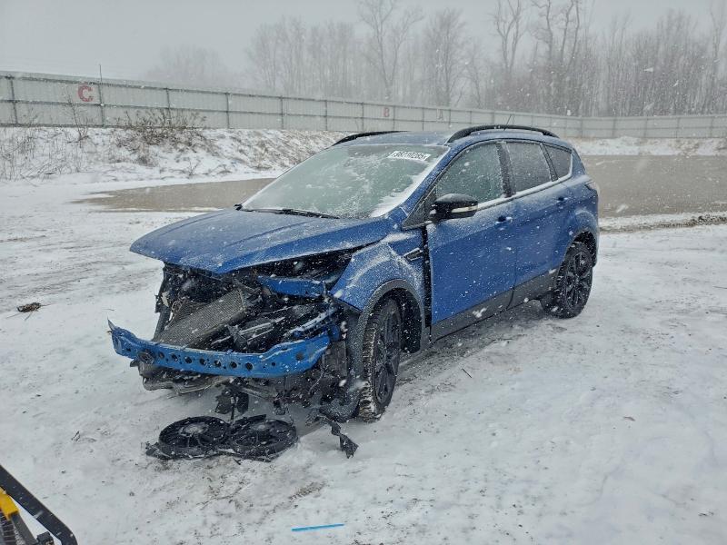 FORD ESCAPE TIT 2017 with VIN 1FMCU0JD9HUB21080 - Photo from auction