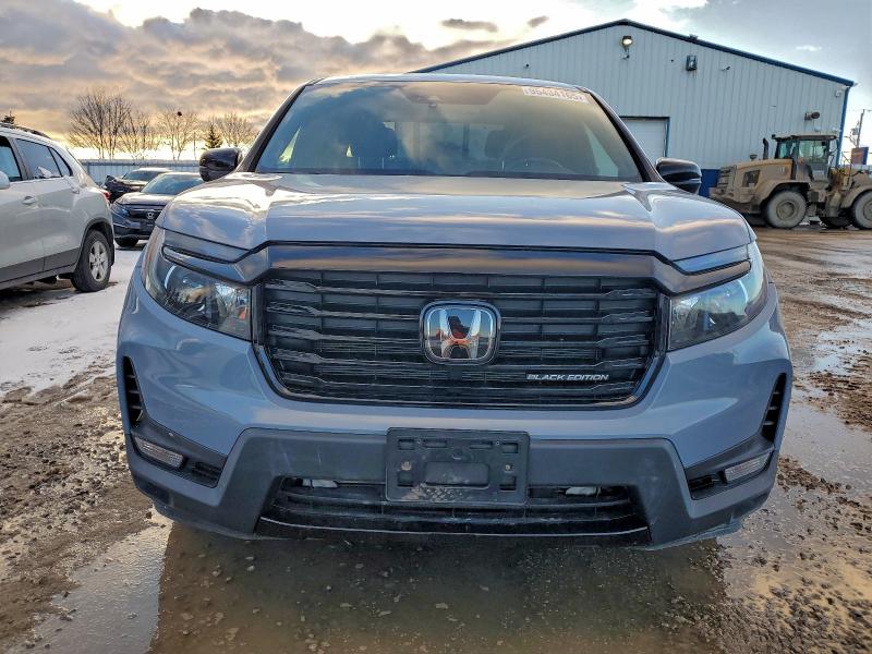Photo 5 from auction – 2022 HONDA RIDGELINE with VIN 5FPYK3F80NB503443