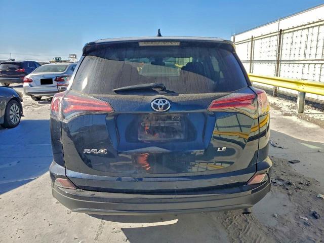 Photo 6 from auction – 2018 TOYOTA RAV4 LE with VIN 2T3ZFREV3JW435221