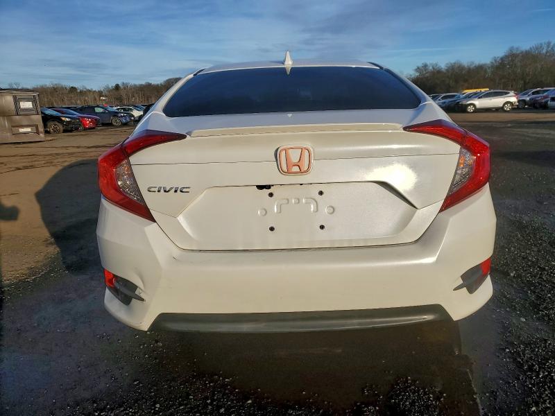 Photo 6 from auction – 2016 HONDA CIVIC with VIN 19XFC1F35GE205582