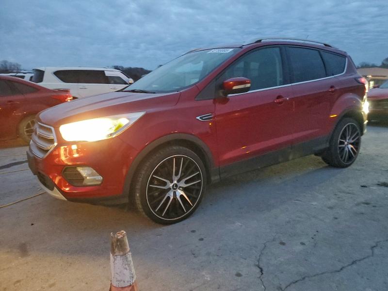 FORD ESCAPE TIT 2017 with VIN 1FMCU9J90HUD45659 - Photo from auction