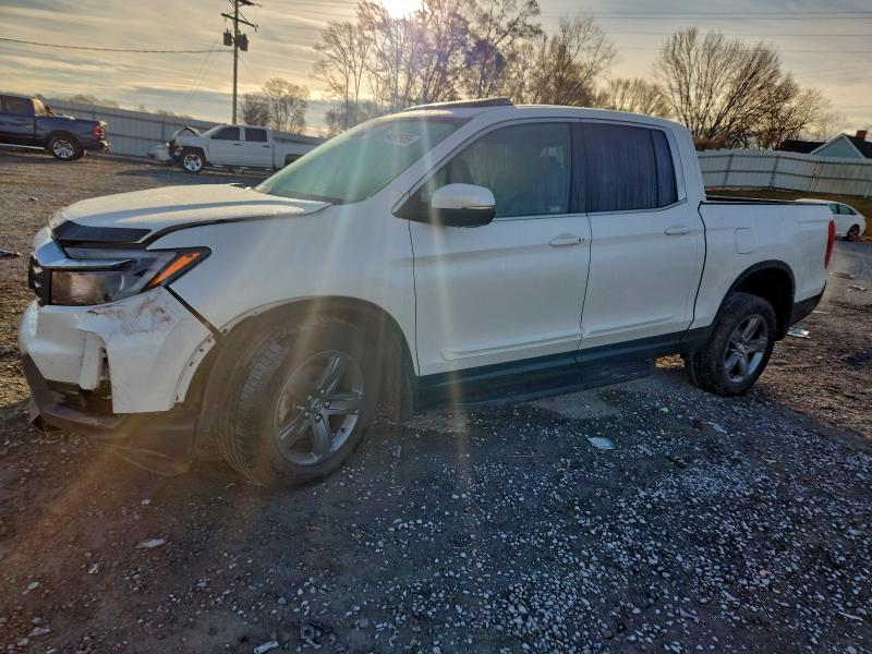 HONDA RIDGELINE 2022 with VIN 5FPYK3F59NB037341 - Photo from auction