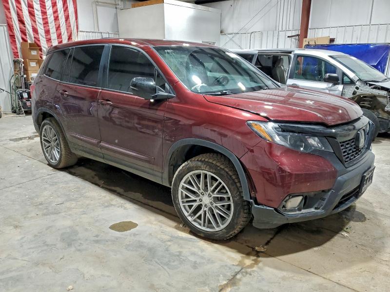 Photo 4 from auction – 2021 HONDA PASSPORT E with VIN 5FNYF8H59MB014874