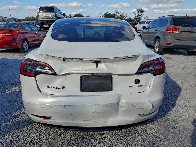 Photo 6 from auction – 2021 TESLA MODEL 3 with VIN 5YJ3E1EC4MF049457