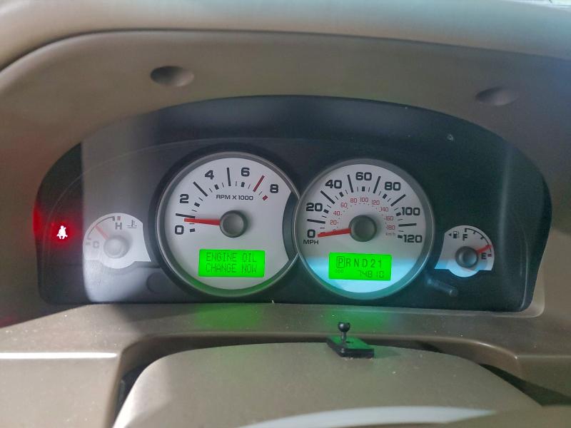 Photo 9 from auction – 2005 FORD ESCAPE LIM with VIN 1FMCU04115KC04754