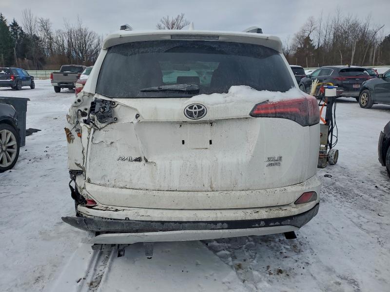 Photo 6 from auction – 2016 TOYOTA RAV4 XLE with VIN 2T3RFREV5GW477091