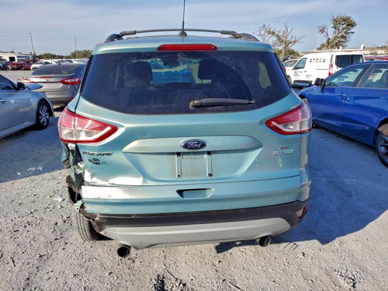 Photo 6 from auction – 2013 FORD ESCAPE with VIN 1FMCU0GX5DUB13053