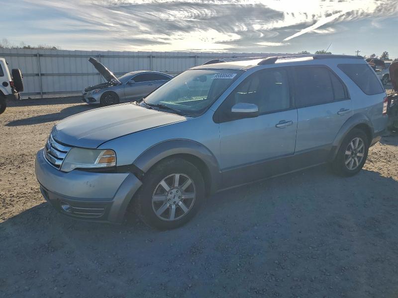 FORD TAURUS X 2008 with VIN 1FMDK02WX8GA27833 - Photo from auction