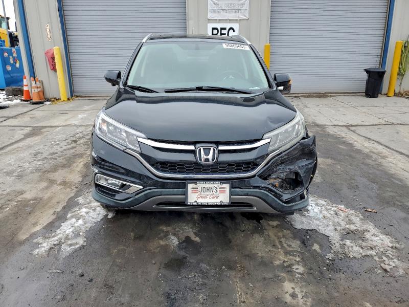 Photo 5 from auction – 2015 HONDA CR-V EXL with VIN 2HKRM4H72FH650142