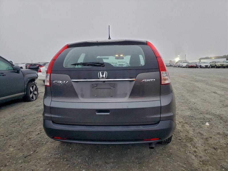 Photo 6 from auction – 2014 HONDA CR-V LX with VIN 2HKRM4H36EH660491