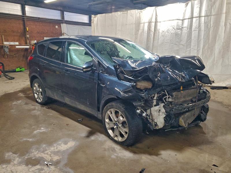 Photo 4 from auction – 2013 FORD ESCAPE with VIN 1FMCU9H98DUD25286