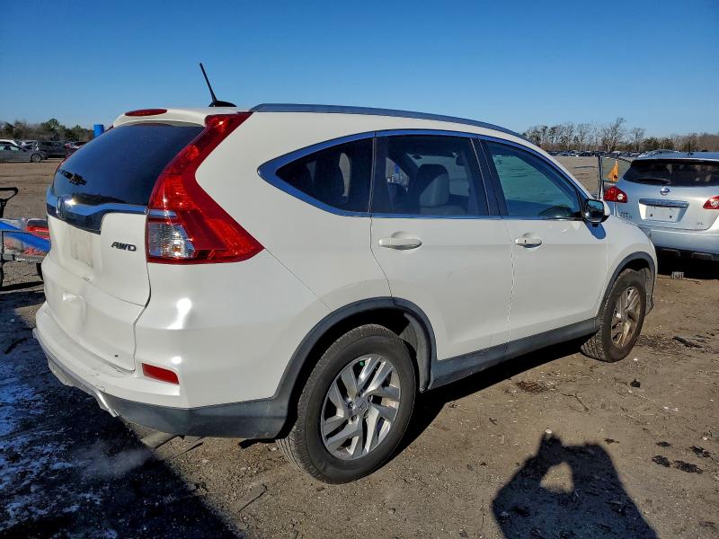 Photo 3 from auction – 2016 HONDA CR-V EXL with VIN 5J6RM4H78GL117333