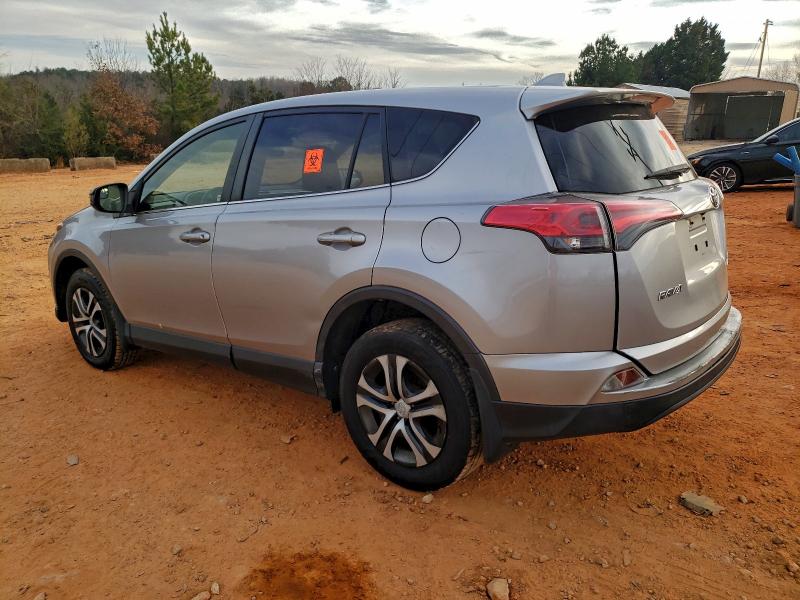 Photo 2 from auction – 2018 TOYOTA RAV4 LE with VIN JTMBFREVXJD252011