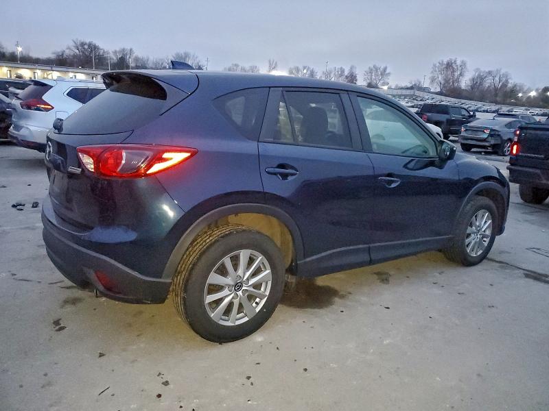 Photo 3 from auction – 2015 MAZDA CX-5 TOURI with VIN JM3KE2CYXF0549633