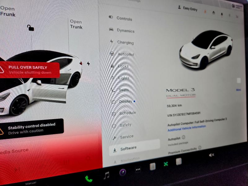 Photo 9 from auction – 2021 TESLA MODEL 3 with VIN 5YJ3E1EC7MF084591