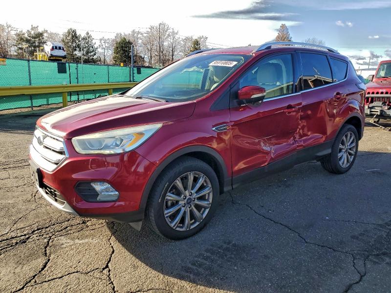 FORD ESCAPE TIT 2017 with VIN 1FMCU9J95HUA23101 - Photo from auction